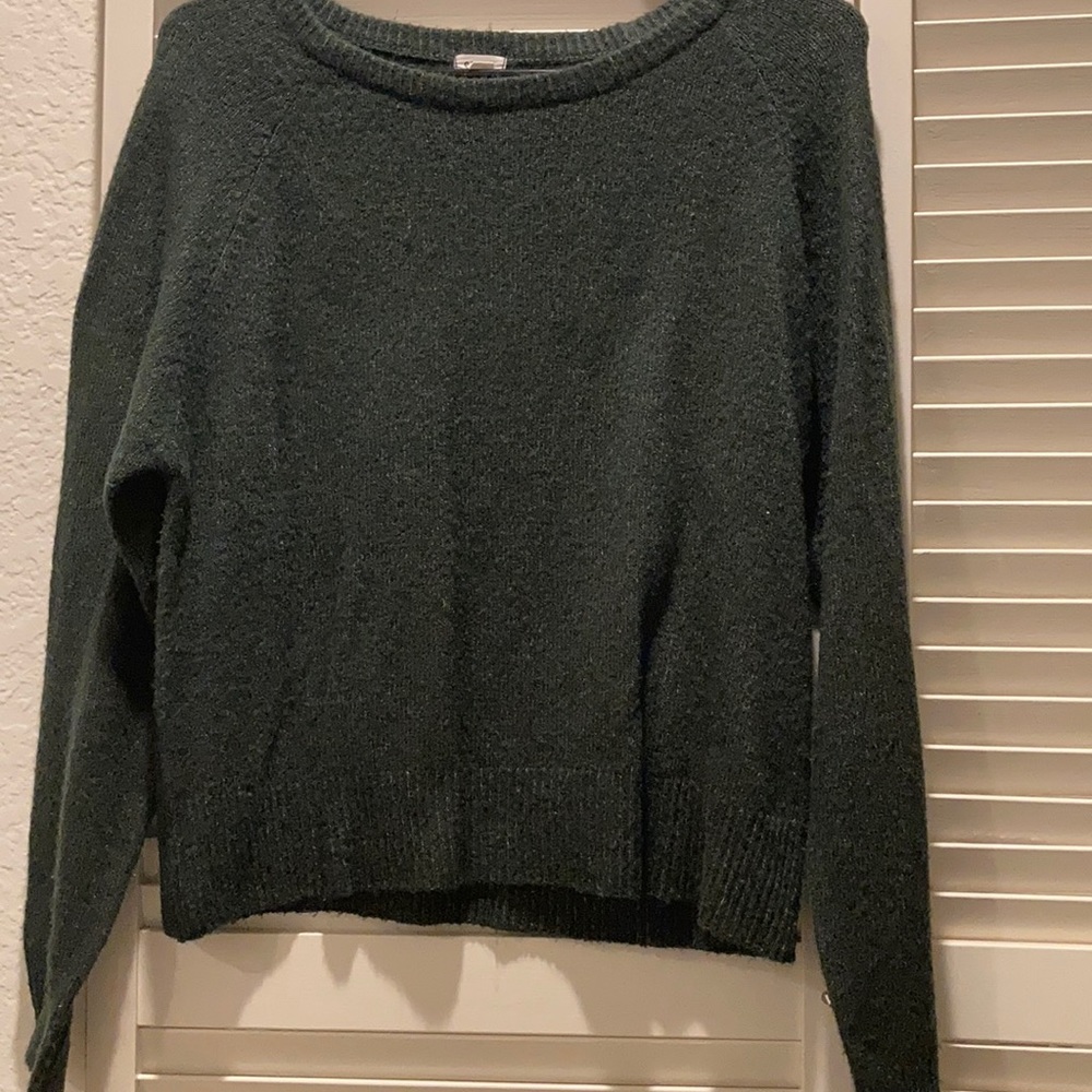 green sweater
